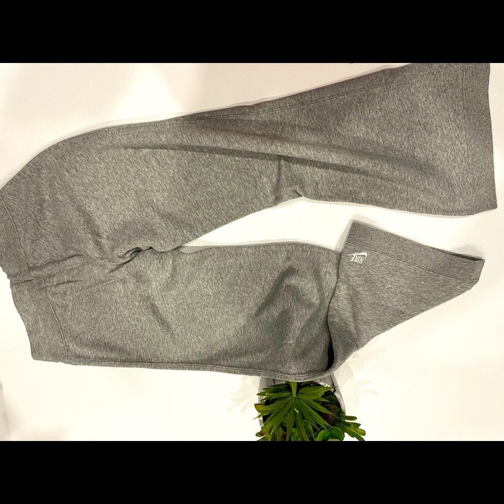 P146- Nike gray jogging pants in size L youth